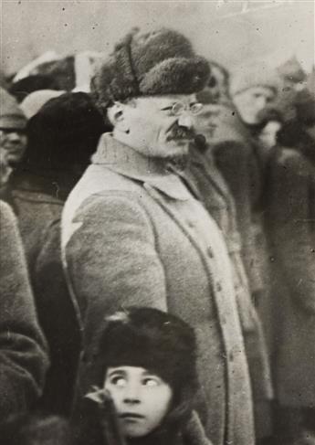 (RUSSIAN REVOLUTION) Portrait of Leon Trotsky (1879-1940) with his son. 1922.                                                                    